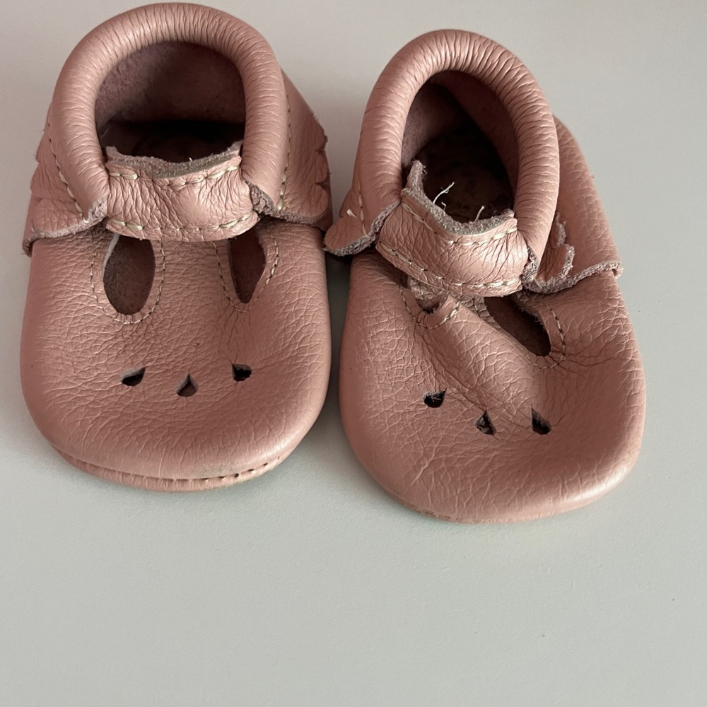 Size 4 gently used Freshly Picked mocs!